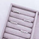 Anel de Prata Bolas com Detalhes Cravejados